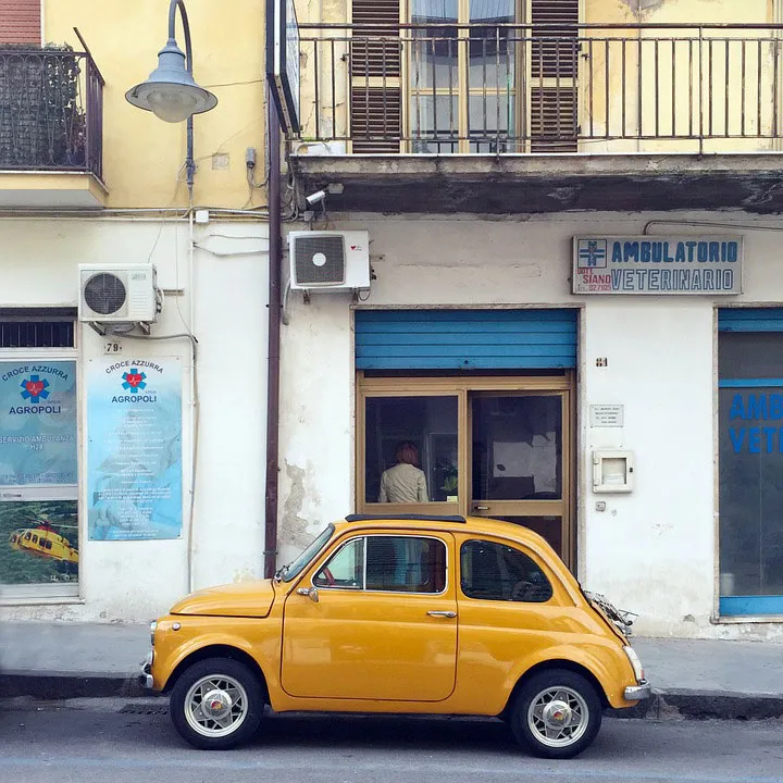A car parallel parked at a curb